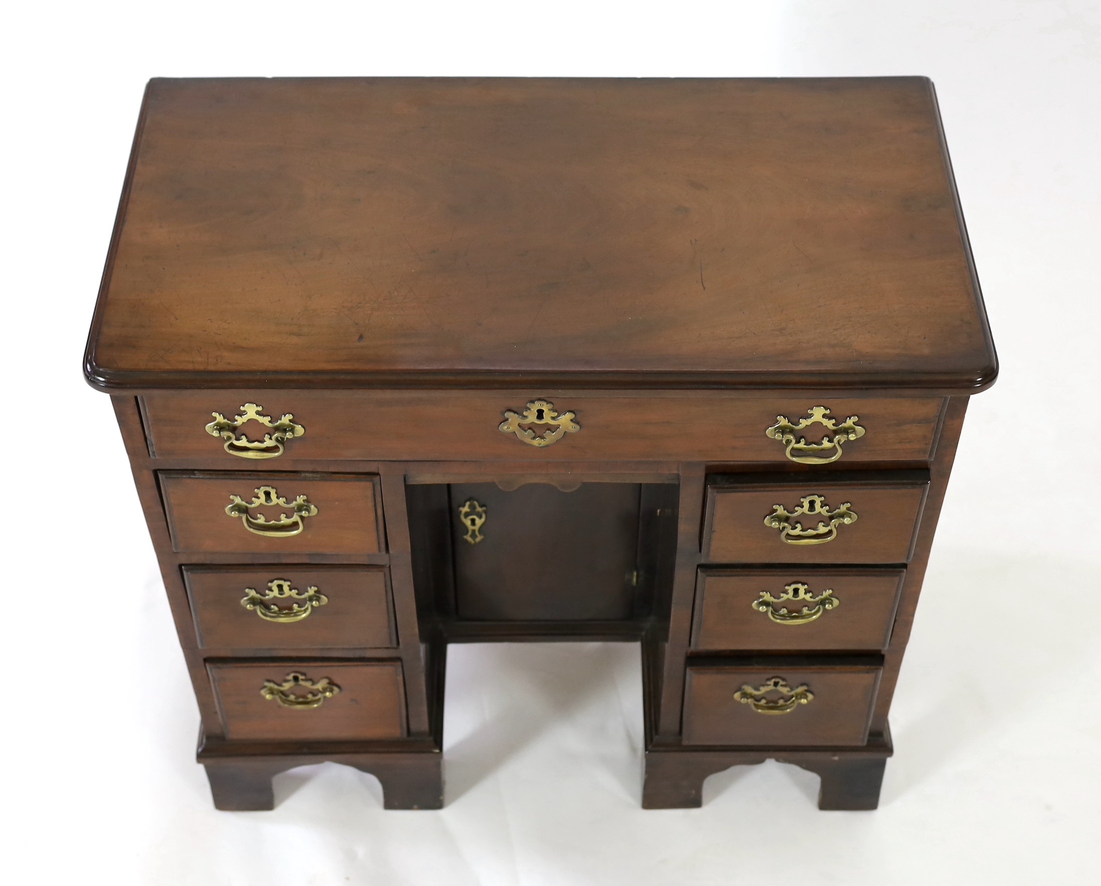 A George III mahogany kneehole desk, W.80cm D.42cm H.76cm